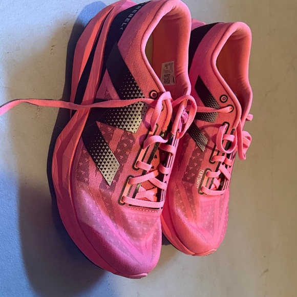 New Balance Shoes - New Balance FuelCell Rebel v4
Women's Pink and Black Athletic Shoes